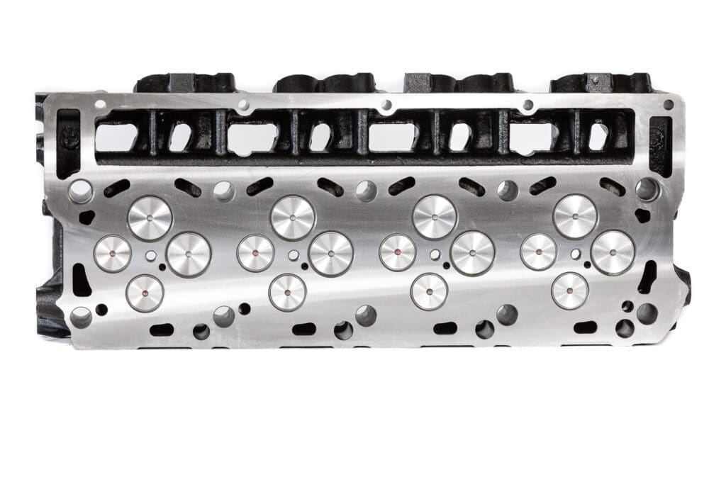 Engine cylinder head with visible valves.