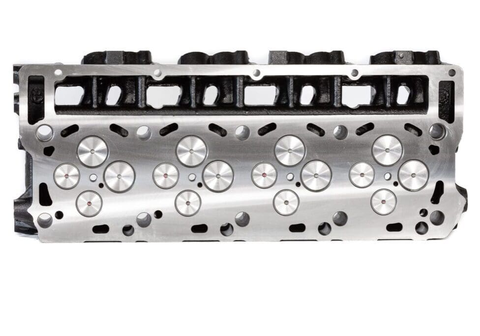 Engine cylinder head with visible valves.